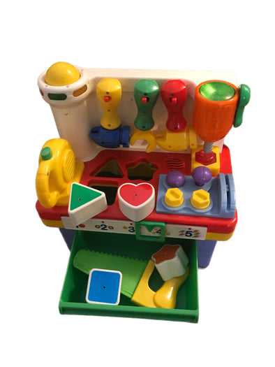 This tool toy is also a Shape Sorter AND a ball drop!