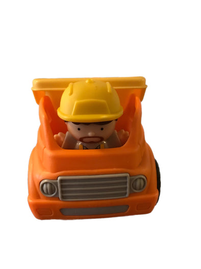 Little construction worker in a dump truck